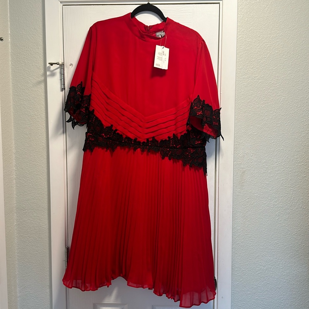 Red ASOS lace dress with short sleeves and pleated skirt
